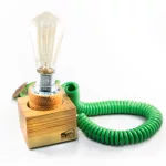 Bailán - Lámpara de mesa original en madera con encendido creativo